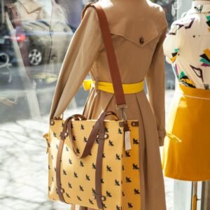 Stylish mannequins showcasing fashion trends in a boutique window in Austin, TX.